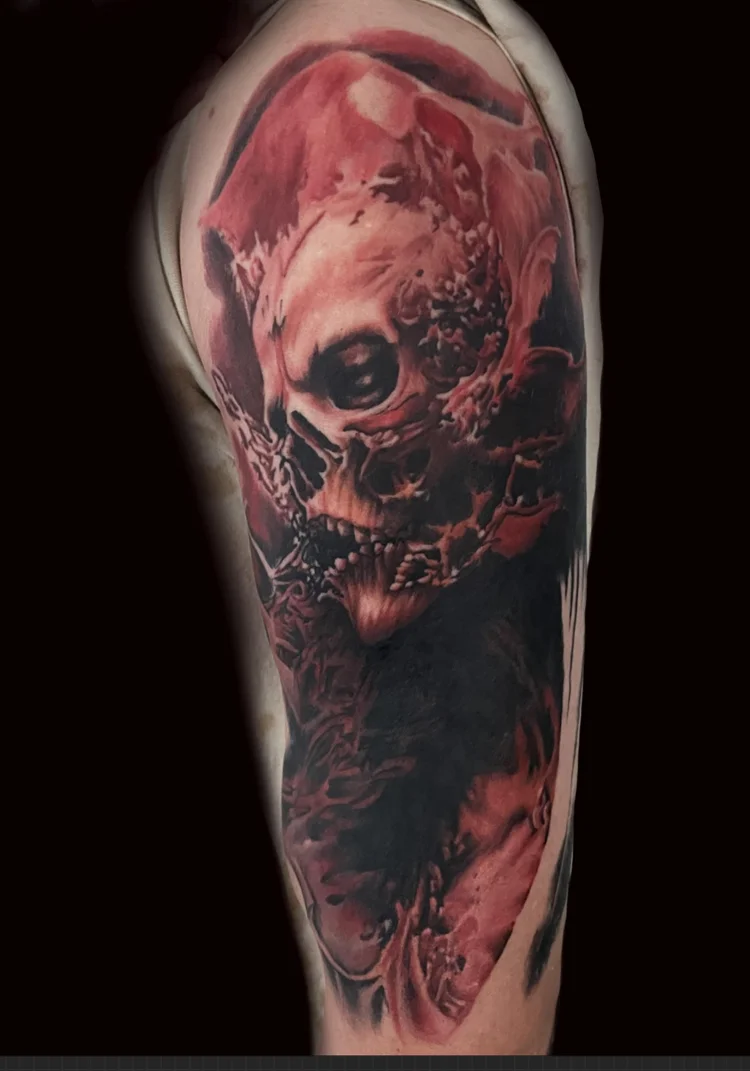 Black and grey skull tattoo by Timmy Grounds